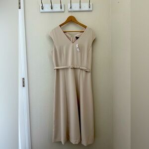 Understated and classic V-neck dress.
